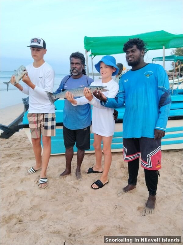 fishing tour with customers catched fishes with childrens
